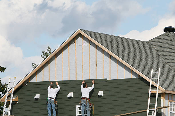 Professional Siding Replacement technician working in Eastover, NC